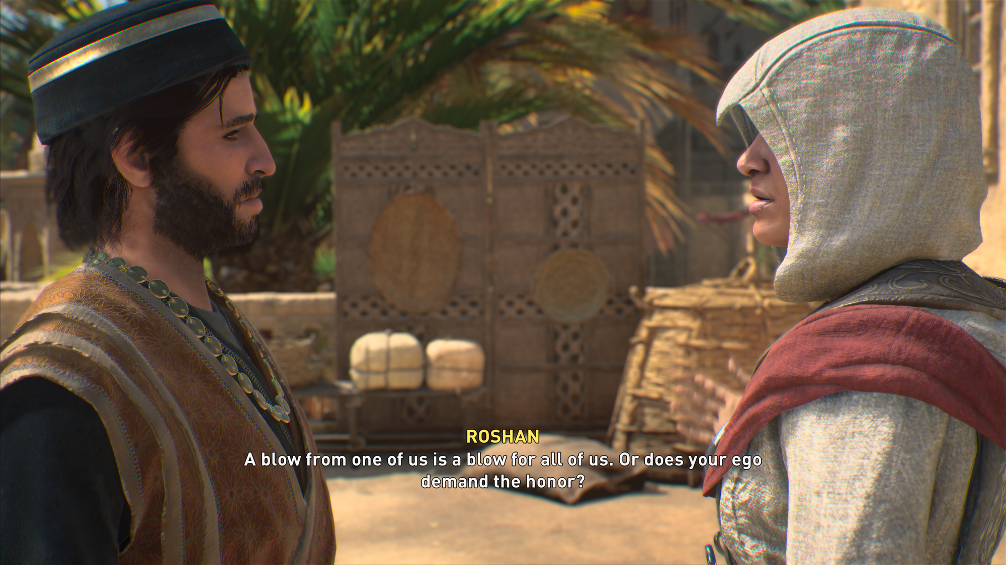A screenshot of Asssassin's Creed mirage depicting a hooded assassin in conversation with a man wearing ornate clothes. Roshan is saying, "A blow from one of us is a blow for all of us. Or does your ego demand the honor?"