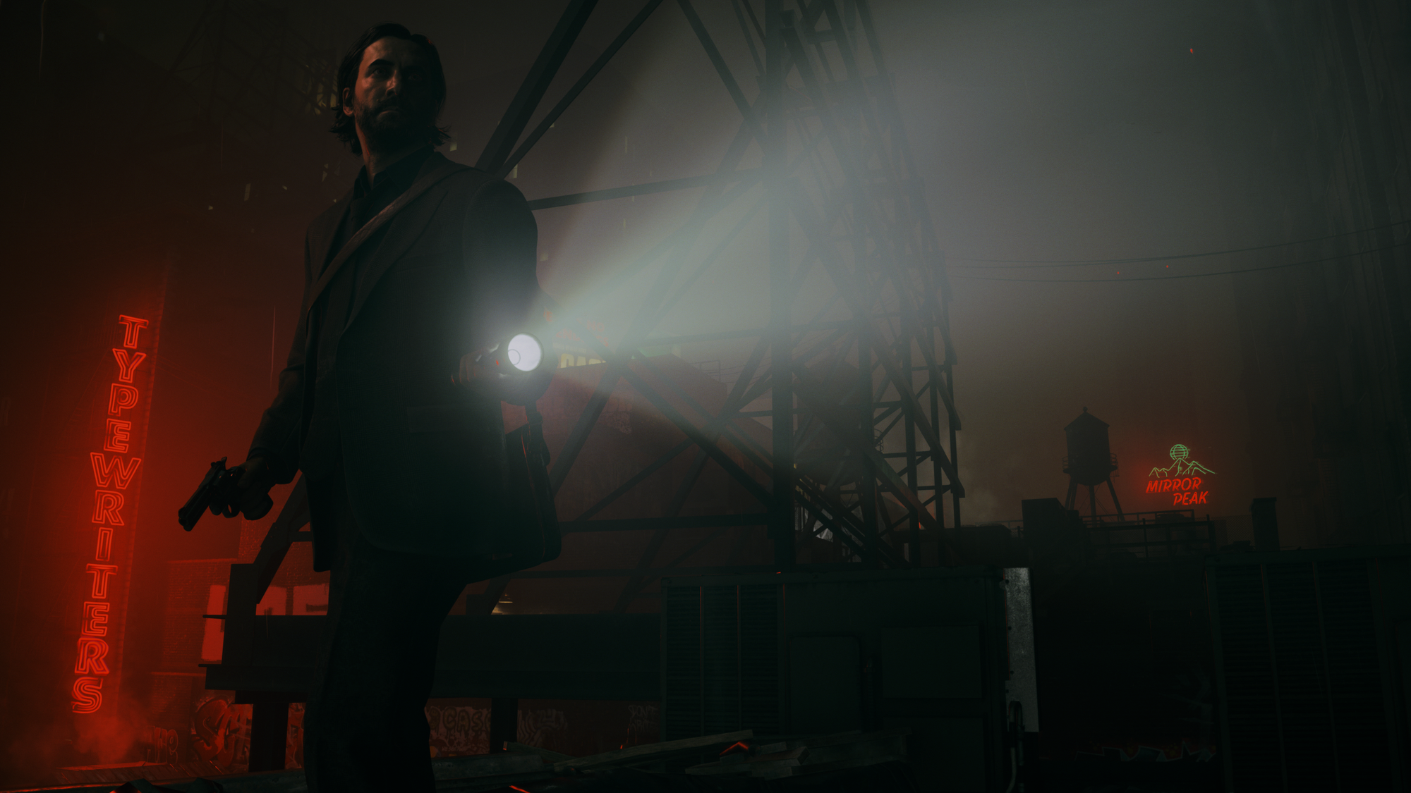 Alan Wake shining his flashlight forward with the Dark Place in the background.